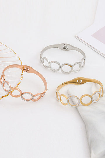 Pulsera redonda de acero de titanio antiguo